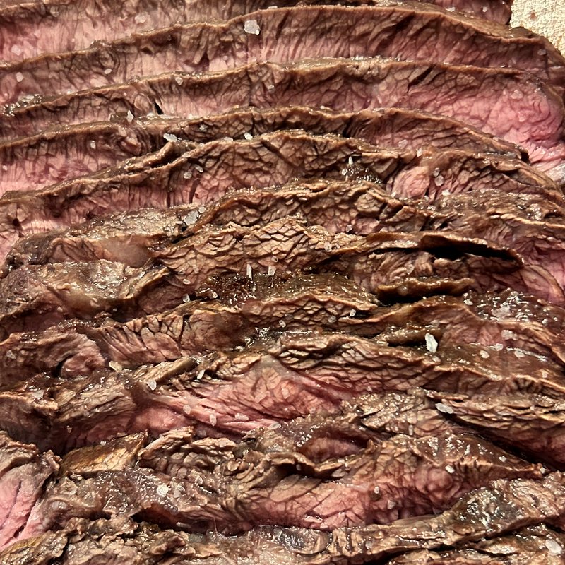 Slices of pink roast beef with sea salt, a Sunday roast in Furness, Cumbria